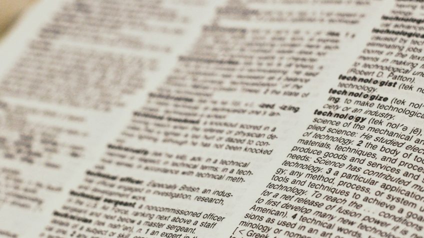 An open dictionary highlighting text terminology