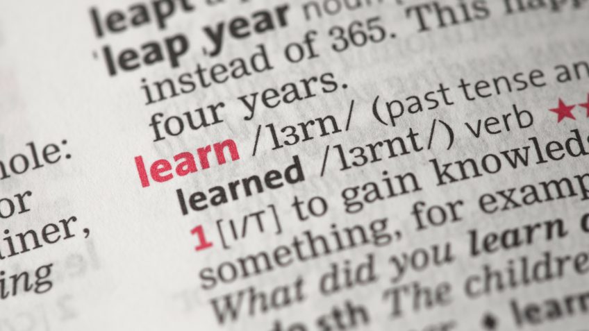 close-up of words on page of dictionary